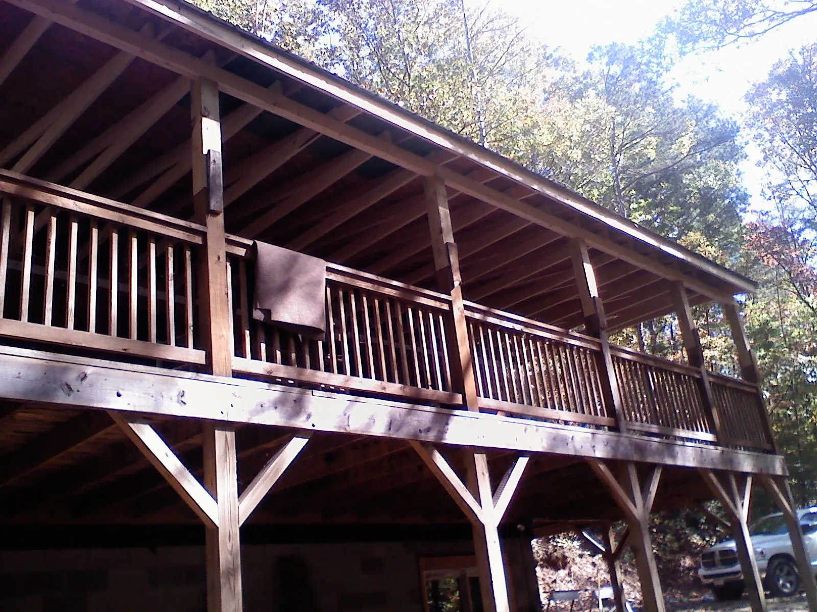 Timber framing under a new elevated porch and deck — Roof Leak Repair in Piney Woods by Roofing Brothers